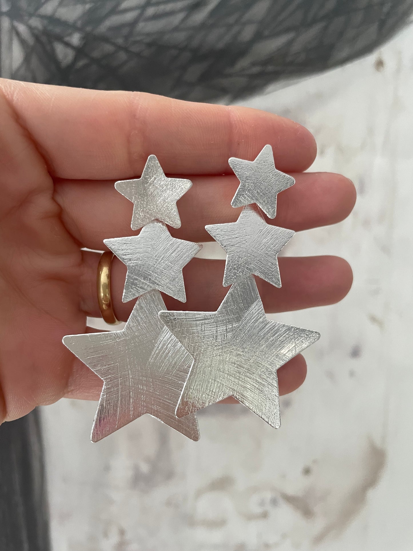 Aros Triple Estrellas enchape de Plata