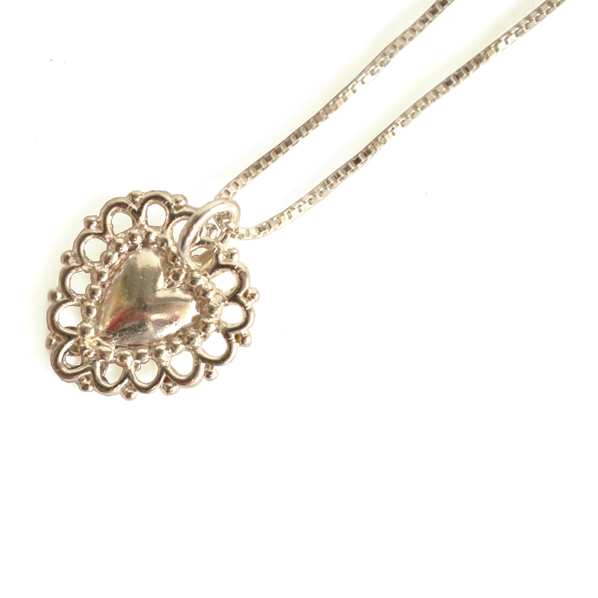 COLLAR CORAZÓN DETENTE CHICO CON DISEÑO BLONDAS EN PLATA 925