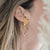 AROS CON CORAZÓN DOBLE, BAÑADO EN ORO Y CRYSTAL